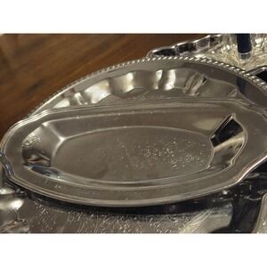 vintage Irvin silverplate bread and pastry serving tray, typically...